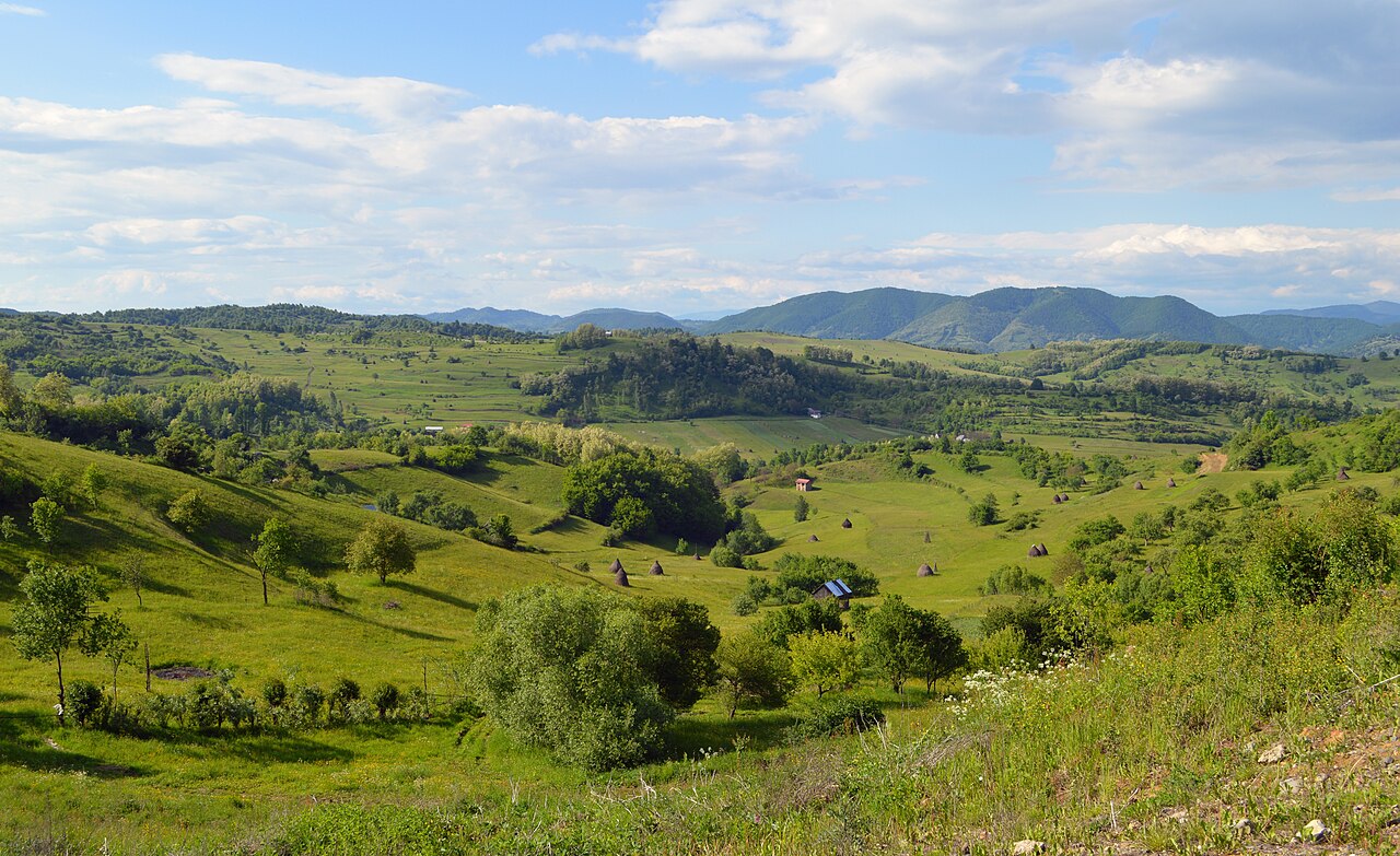 Rolling green hills and villages of Maramureș, Romania